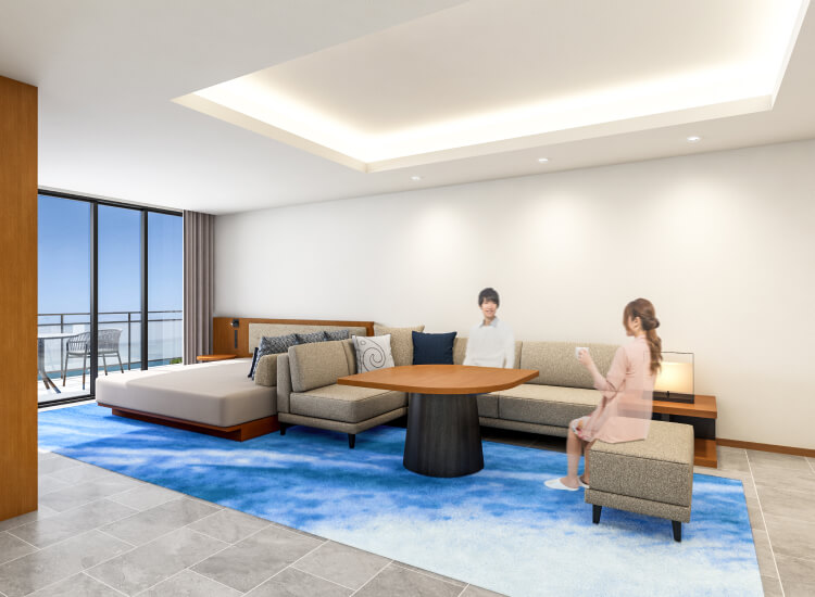 広々としたリビングルームで、ソファに座る女性とカジュアルに過ごす男性が描かれている。大きな窓からは自然光が差し込み、青を基調としたラグが目を引く。